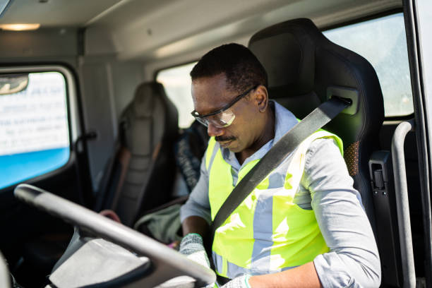 Trucker driver inside the truck at a construction site